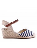 Wedge heel sandal in faux suede with a buckle strap for women