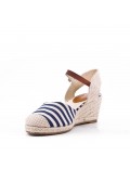 Wedge heel sandal in faux suede with a buckle strap for women