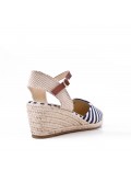 Wedge heel sandal in faux suede with a buckle strap for women