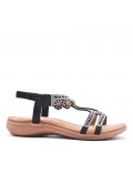 Flat sandals in faux leather for women