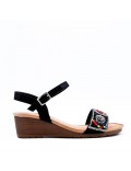 Women wedge sandal in faux leather 