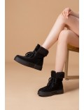 Faux suede ankle boot with lace-up fur