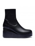 Faux leather ankle boot with sock upper