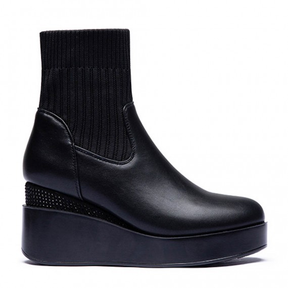 Faux leather ankle boot with sock upper