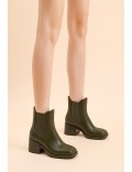 Elastic ankle boot on the sides in faux leather