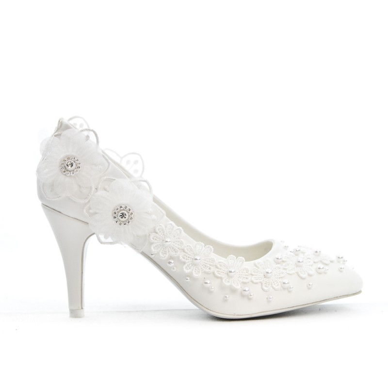 white pumps with flowers
